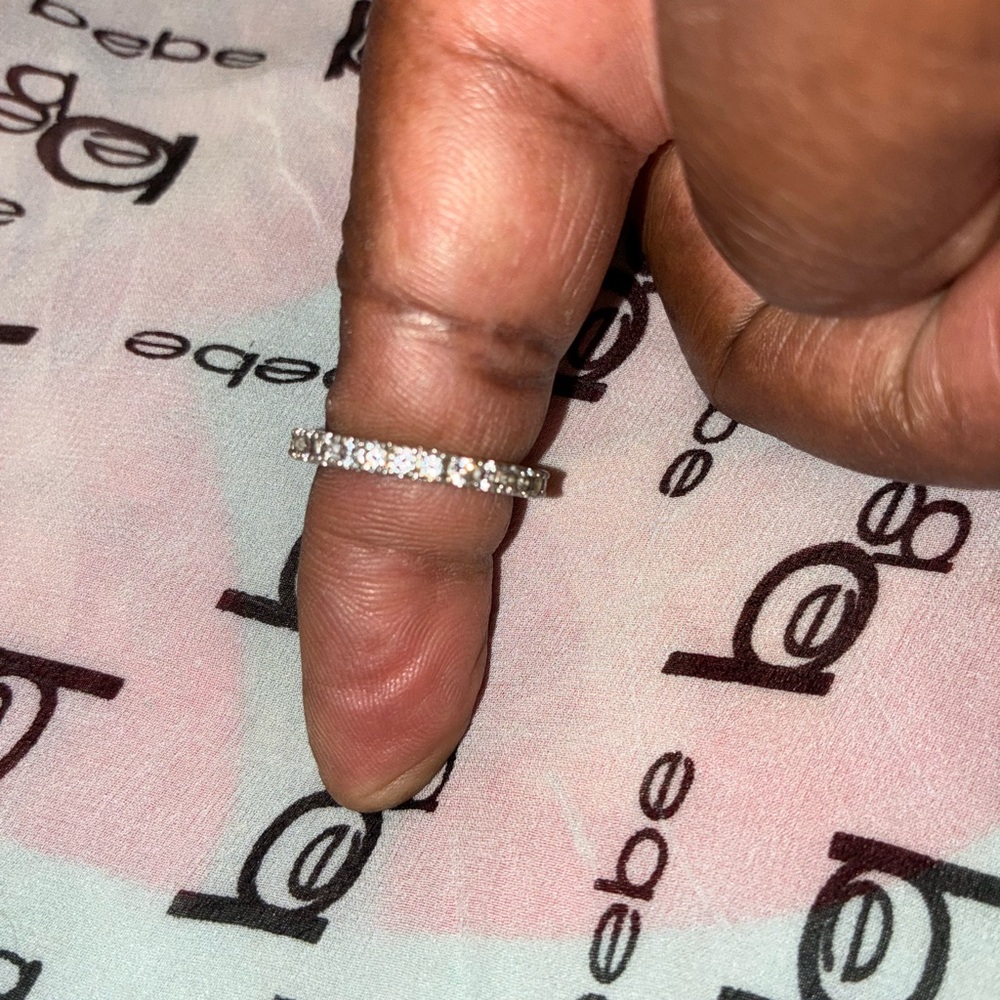 Elegant Silver Band Ring with Sparkling Stones